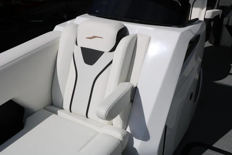 Slide: The Image of Luxurious seating on 2026 Evotti 725 CS Tri-Toon boat, featuring sleek white upholstery. - 32