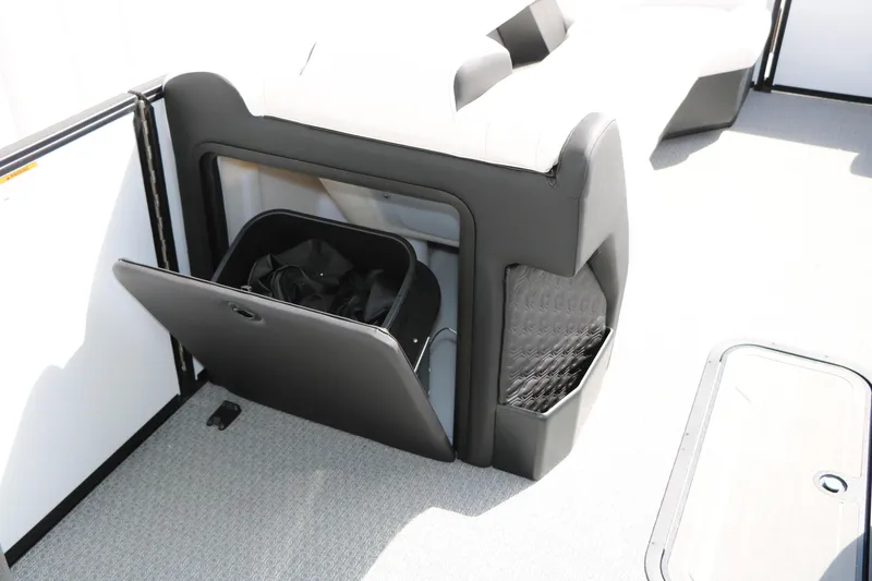 Slide: The Image of Storage compartment on 2026 Evotti 725 CS Tri-Toon boat, featuring sleek design and ample space. - 36