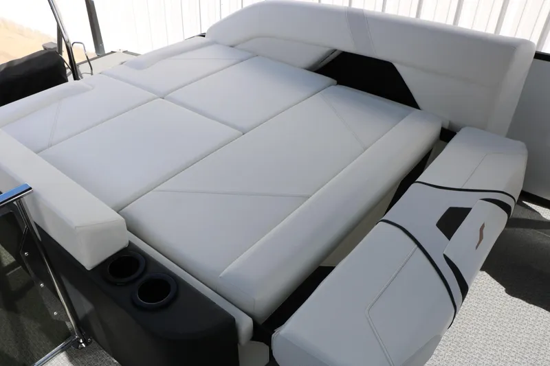 Slide: The Image of Luxurious white seating on 2026 Evotti 725 CS Tri-Toon boat, featuring cup holders. - 39