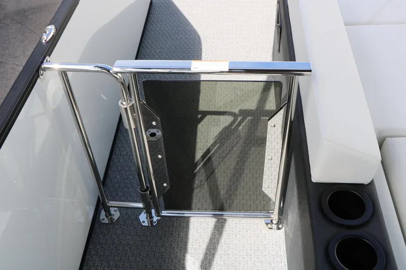 Slide: The Image of Interior view of 2026 Evotti 725 CS Tri-Toon boat with gate and seating. - 40