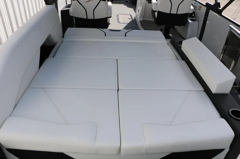 Slide: The Image of Luxurious white seating on 2026 Evotti 725 CS Tri-Toon boat interior. - 45