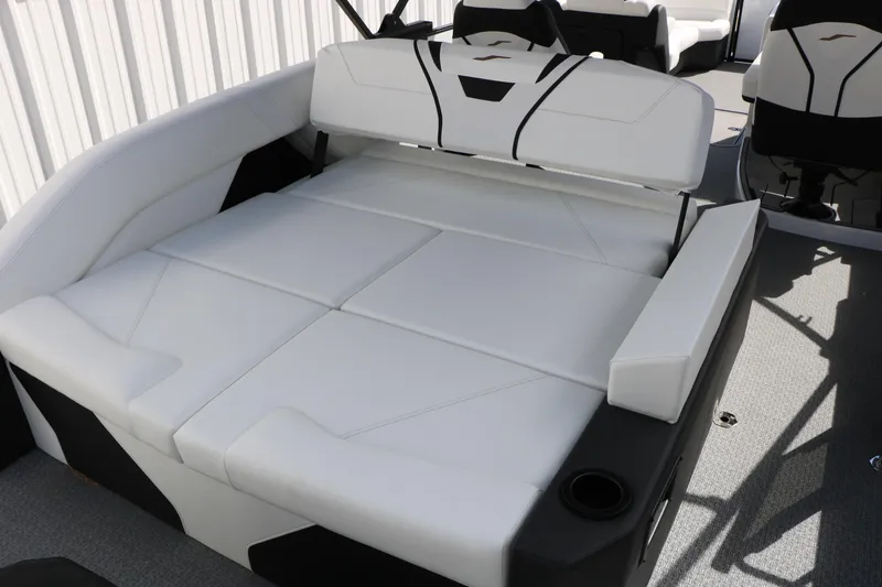 Slide: The Image of 2026 Evotti 725 CS Tri-Toon boat interior with luxurious white seating and modern design. - 46