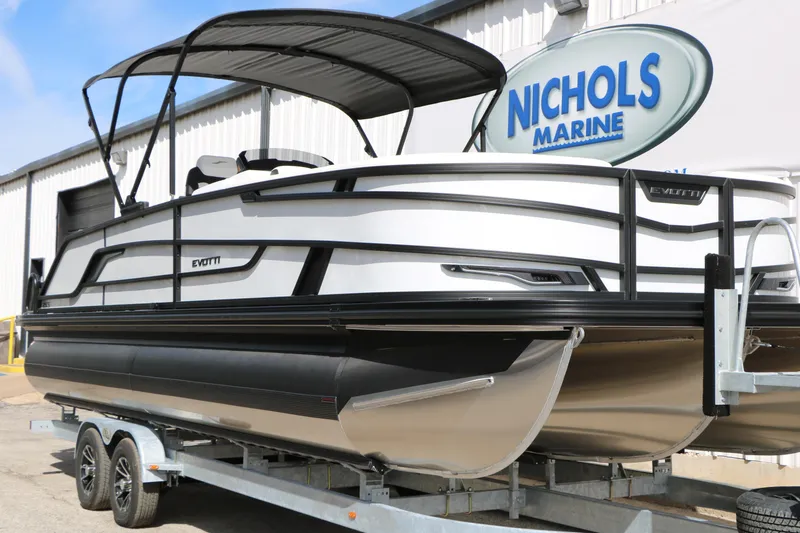 Slide: The Image of 2026 Evotti 725 CS Tri-Toon boat on trailer at Nichols Marine dealership. - 5