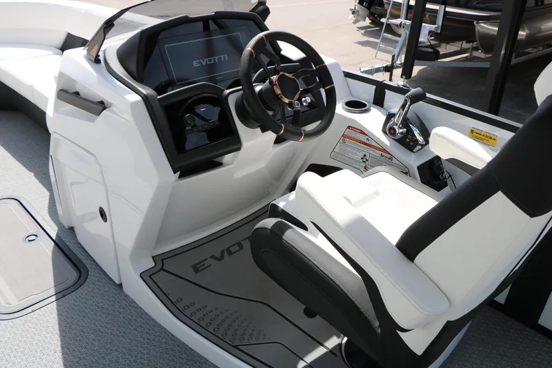 Slide: The Image of 2026 Evotti 725 CS Tri-Toon boat cockpit with modern steering and controls. - 52