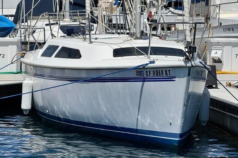 The Image of Catalina 250 sailboat docked at marina, 2003 model, front view. - 0