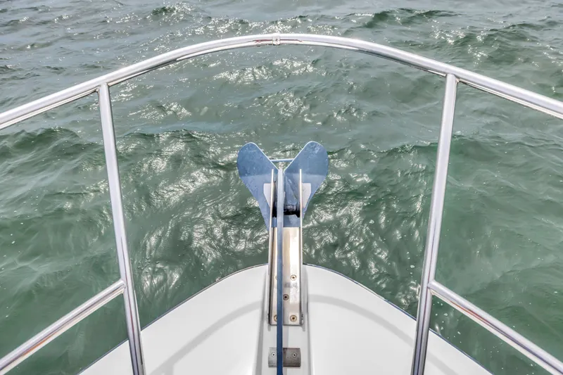 Slide: The Image of Bow view of 2019 Beneteau Gran Turismo 46 yacht on open water. - 23