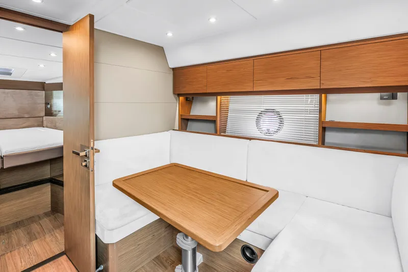 Slide: The Image of Luxurious interior of 2019 Beneteau Gran Turismo 46 yacht with elegant wood finishes. - 44