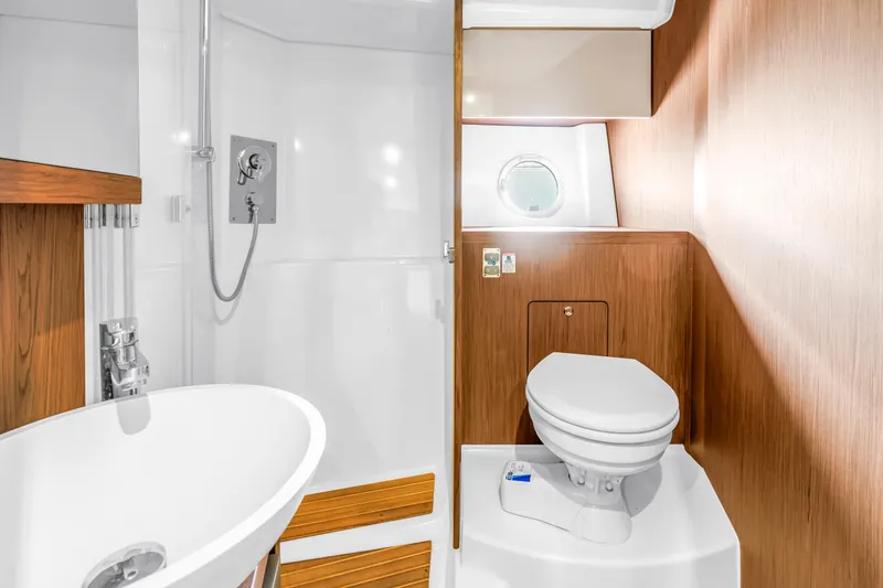 Slide: The Image of Luxurious bathroom in 2019 Beneteau Gran Turismo 46 yacht with modern fixtures. - 48