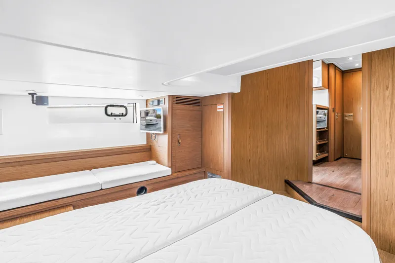 Slide: The Image of Luxurious interior of 2019 Beneteau Gran Turismo 46 yacht with modern wood finish. - 54