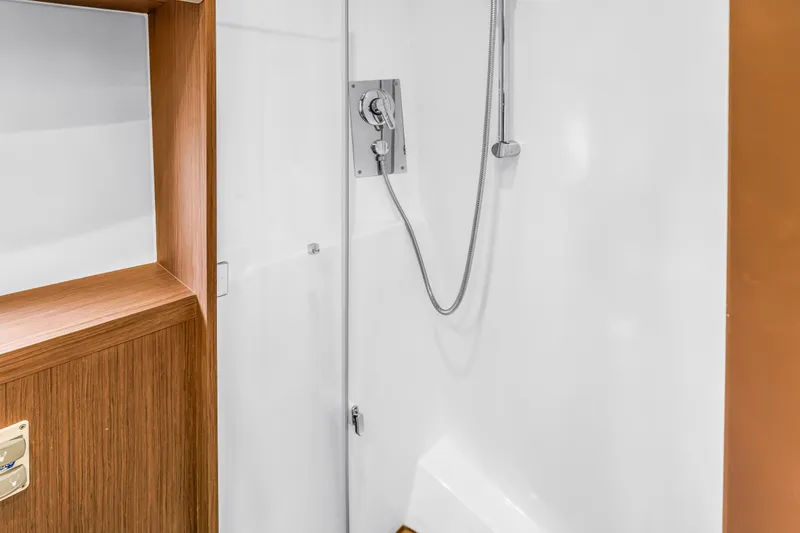 Slide: The Image of Shower area in 2019 Beneteau Gran Turismo 46 yacht, featuring sleek design and modern fixtures. - 56