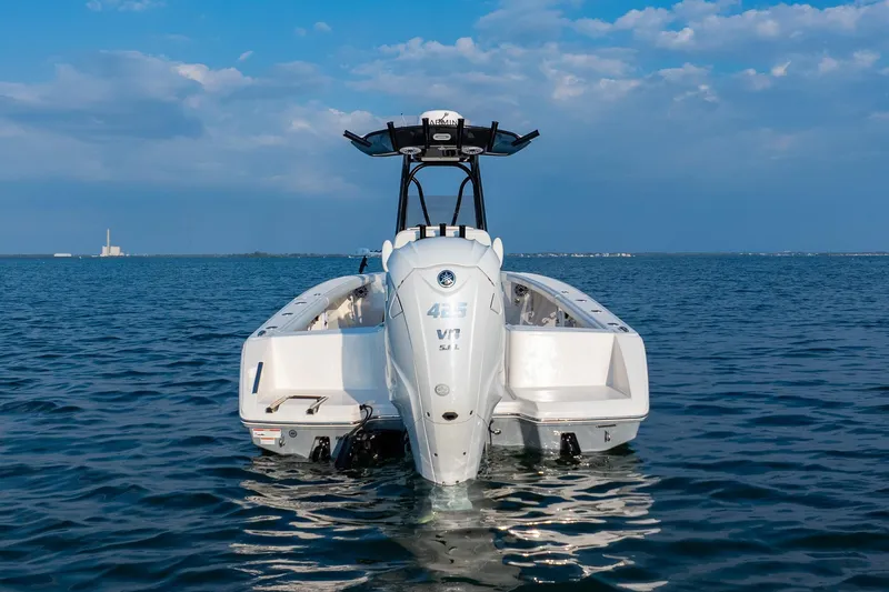 Slide: The Image of 2023 Pathfinder 2700 Open boat on calm ocean waters under blue sky. - 10