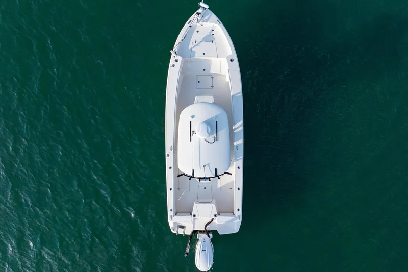 Slide: The Image of Top view of 2023 Pathfinder 2700 Open boat on clear water. - 16