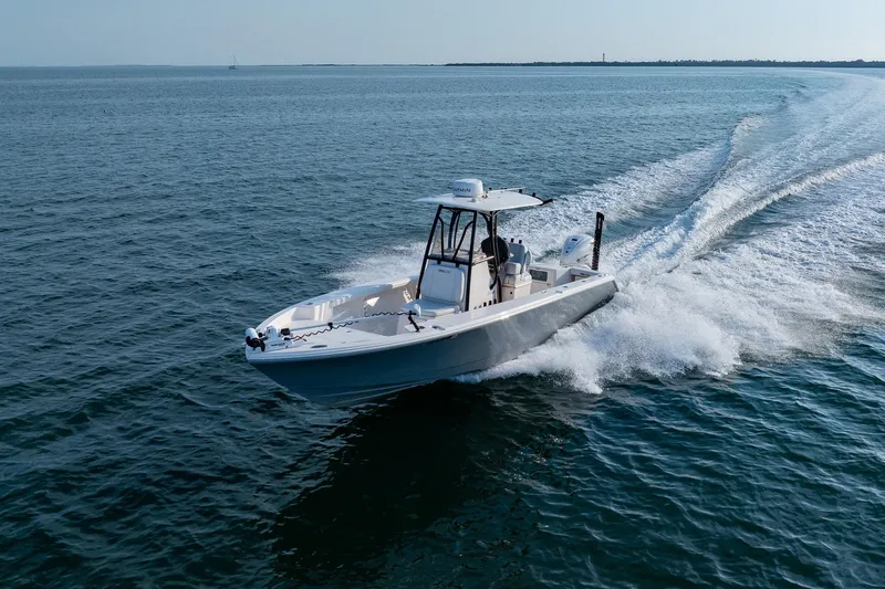 Slide: The Image of 2023 Pathfinder 2700 Open boat cruising on open water. - 19