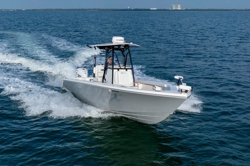 Slide: The Image of 2023 Pathfinder 2700 Open boat cruising on open water, showcasing sleek design and performance. - 21