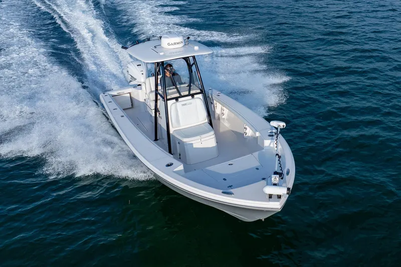 Slide: The Image of 2023 Pathfinder 2700 Open boat cruising on open water, showcasing sleek design and performance. - 22
