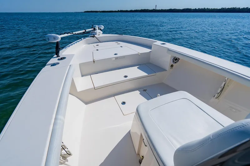 Slide: The Image of 2023 Pathfinder 2700 Open boat interior on calm blue water. - 29