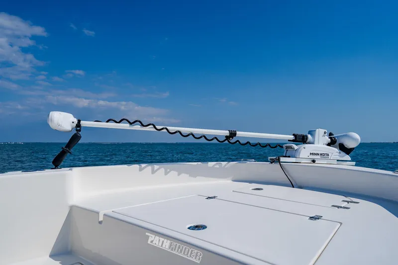 Slide: The Image of 2023 Pathfinder 2700 Open boat with Minn Kota trolling motor on calm sea. - 30