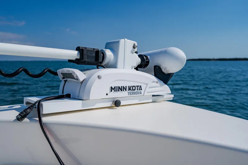 Slide: The Image of Minn Kota Terrova trolling motor on 2023 Pathfinder 2700 Open boat, ocean background. - 31