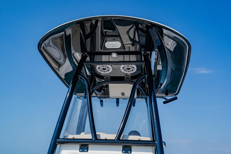 Slide: The Image of 2023 Pathfinder 2700 Open boat's T-top against clear blue sky. - 34