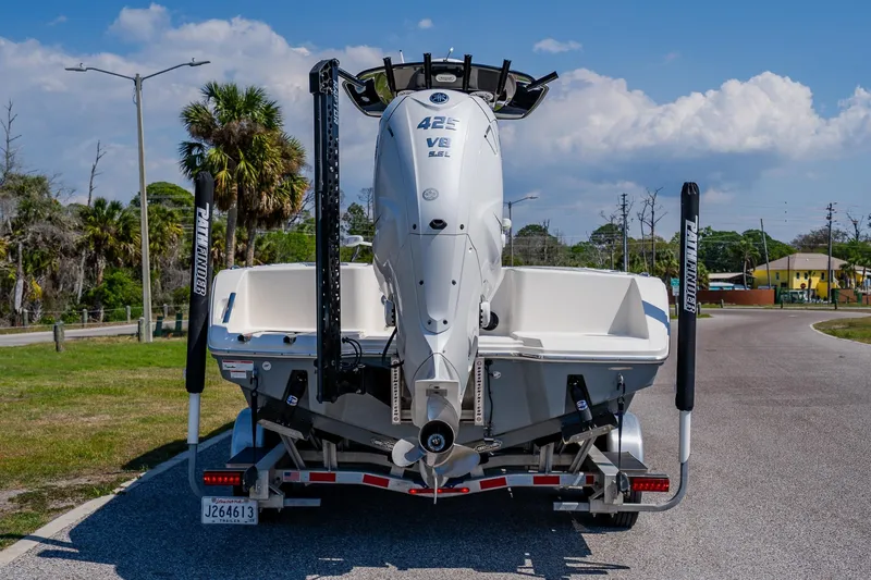 Slide: The Image of 2023 Pathfinder 2700 Open boat on trailer, rear view with outboard motor. - 4