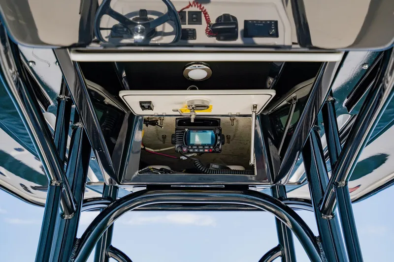 Slide: The Image of 2023 Pathfinder 2700 Open boat console with steering wheel and electronic controls. - 46