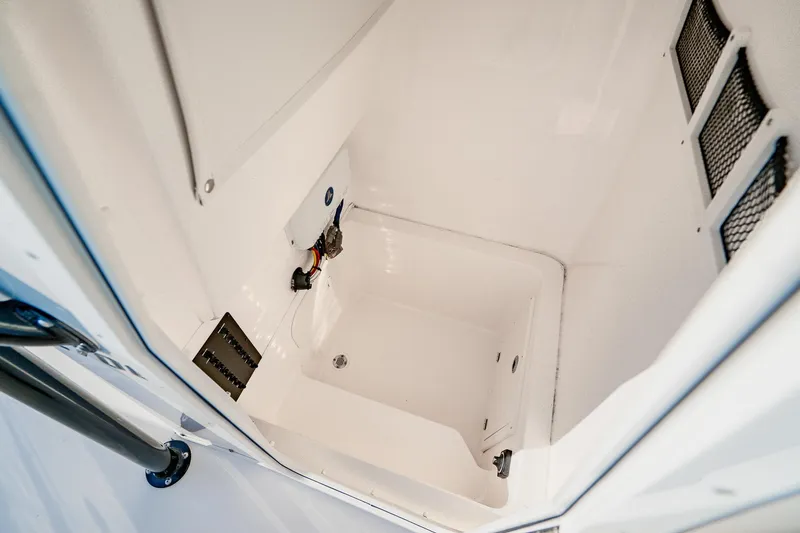 Slide: The Image of Interior view of 2023 Pathfinder 2700 Open boat compartment, showcasing clean design and utility. - 60