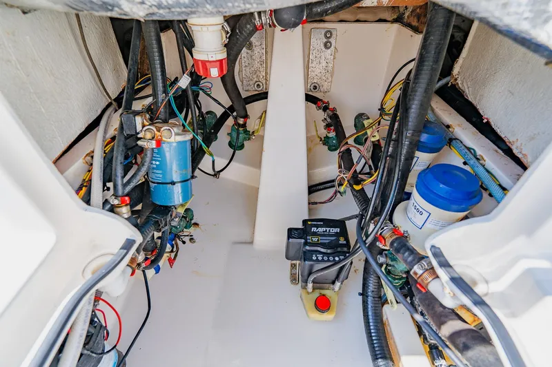 Slide: The Image of Engine compartment of 2023 Pathfinder 2700 Open boat with wiring and components. - 69
