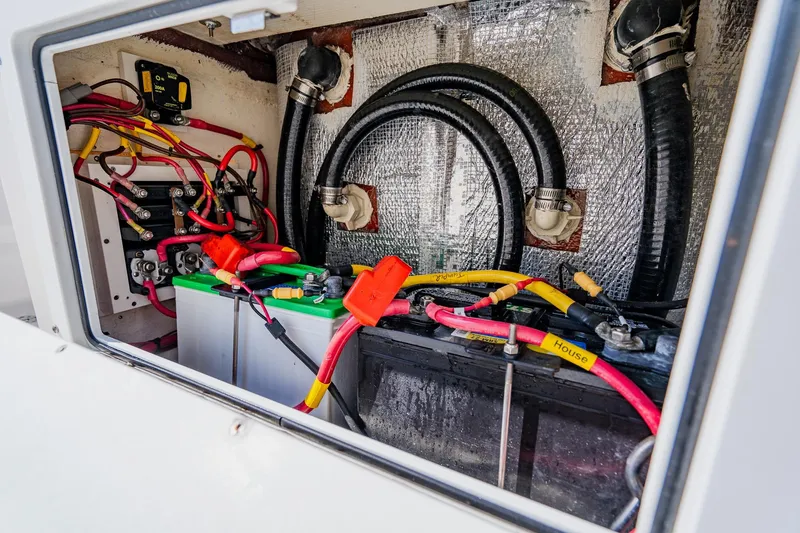 Slide: The Image of Electrical wiring and battery setup in 2023 Pathfinder 2700 Open boat. - 73