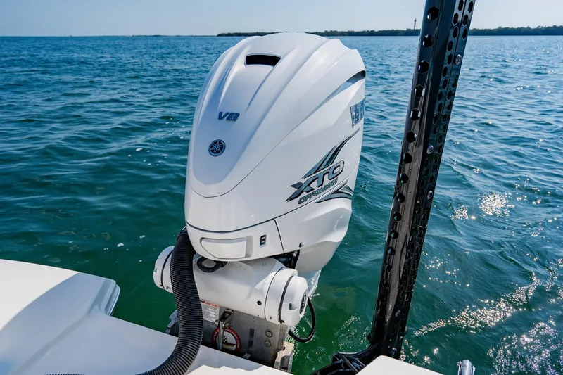 Slide: The Image of 2023 Pathfinder 2700 Open with Yamaha V8 XTO outboard engine on open water. - 74