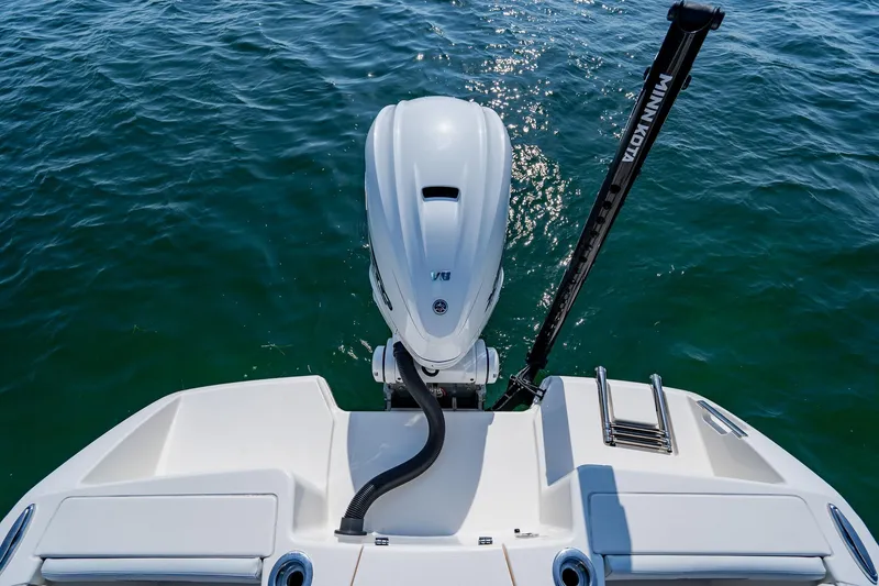 Slide: The Image of 2023 Pathfinder 2700 Open boat with outboard motor on calm water. - 75