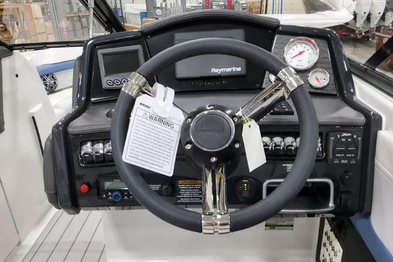 Slide: The Image of Steering console of 2026 Formula 240 Bowrider with Raymarine electronics and gauges. - 10
