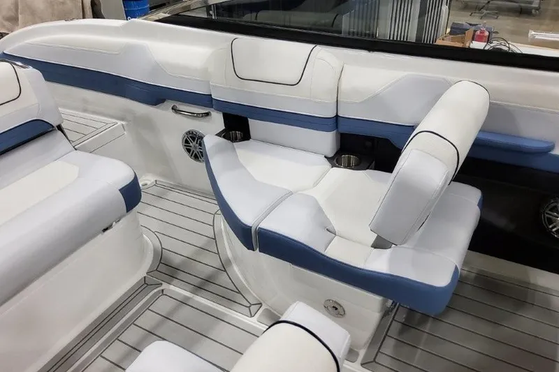 Slide: The Image of 2026 Formula 240 Bowrider interior with white and blue seating, showcasing modern design. - 12