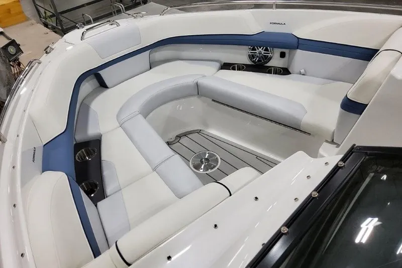 Slide: The Image of 2026 Formula 240 Bowrider boat interior with luxurious seating and modern design. - 16