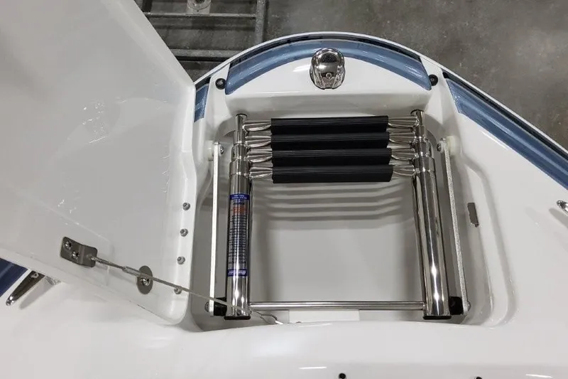 Slide: The Image of 2026 Formula 240 Bowrider boat ladder compartment with stainless steel fittings. - 17