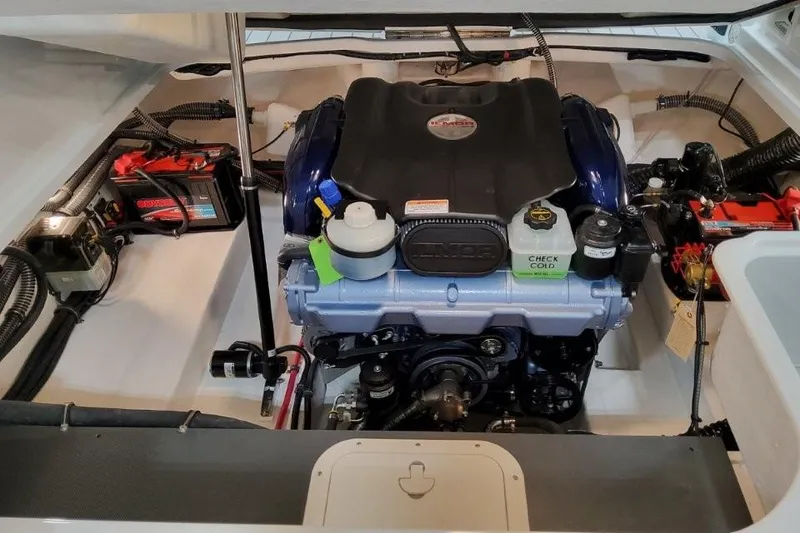 Slide: The Image of Engine compartment of 2026 Formula 240 Bowrider boat, featuring a powerful motor setup. - 18