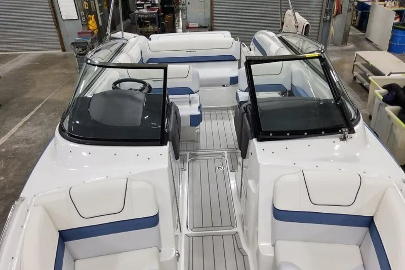 Slide: The Image of 2026 Formula 240 Bowrider boat interior with sleek seating and modern design. - 7