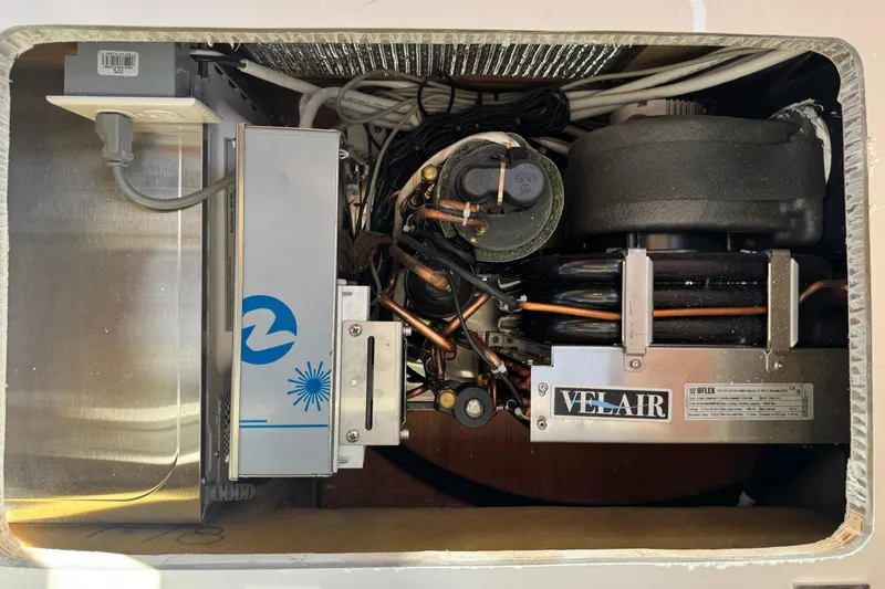 Slide: The Image of Cutwater C-248 Coupe 2026 boat engine compartment with Velair system components. - 18