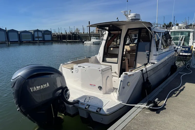 Slide: The Image of 2026 Cutwater C-248 Coupe boat docked with Yamaha engine. - 3