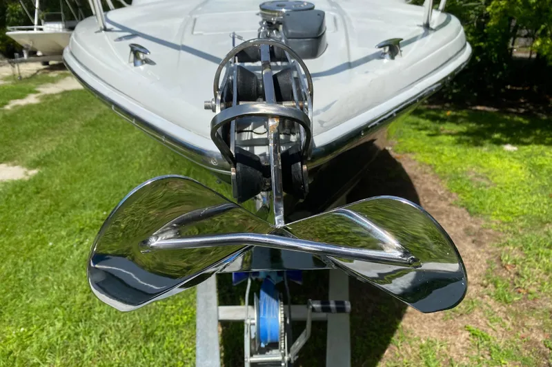 Slide: The Image of 2005 Formula 280 Sun Sport boat anchor detail on grassy background. - 11