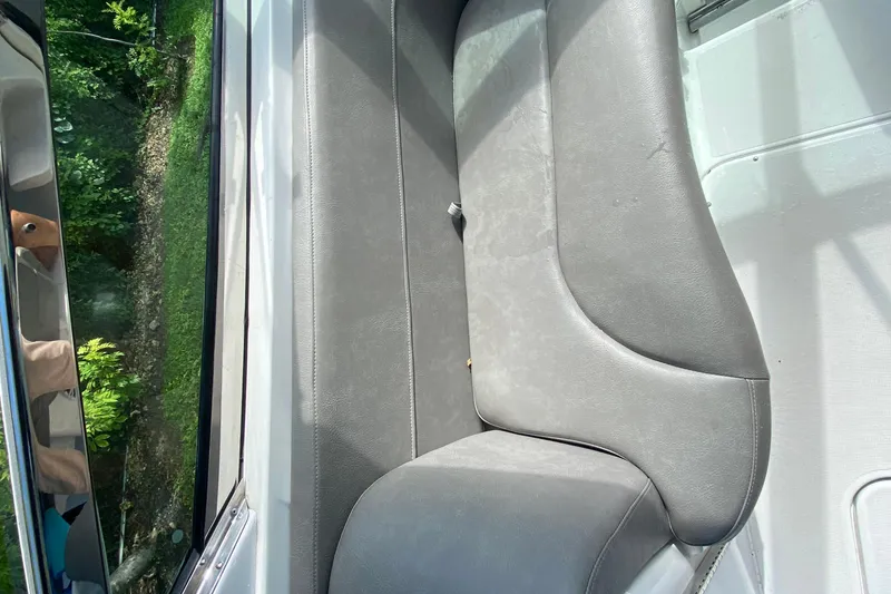 Slide: The Image of 2005 Formula 280 Sun Sport boat interior with gray leather seating. - 28