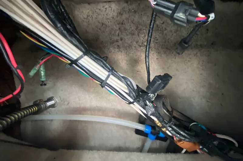 Slide: The Image of Wiring and cables inside a 2005 Formula 280 Sun Sport boat. - 54