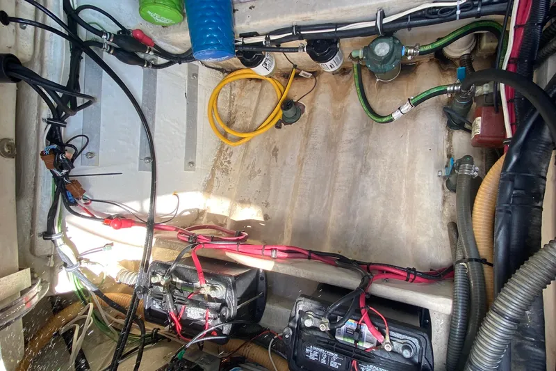 Slide: The Image of Engine compartment of a 2005 Formula 280 Sun Sport boat, showing wiring and components. - 56