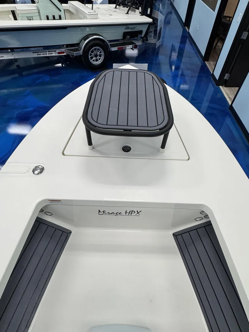 Slide: The Image of Maverick HPX-S 2026 boat in showroom with blue floor coating. - 10