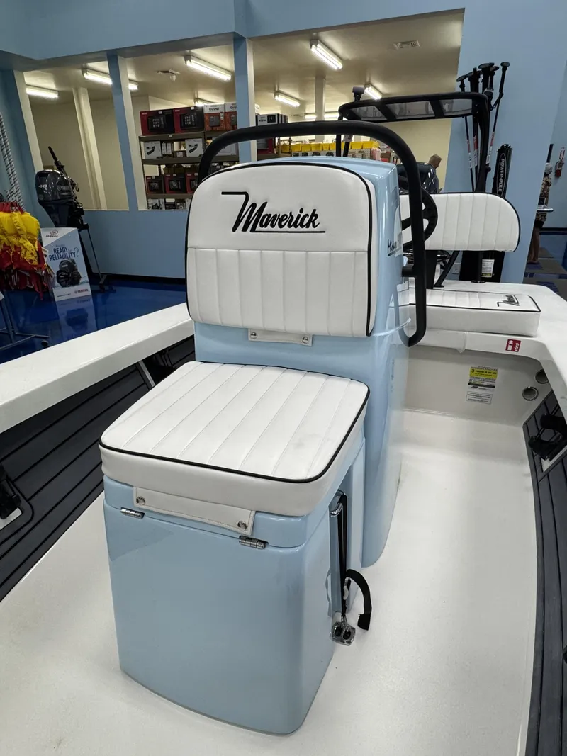 Slide: The Image of 2026 Maverick HPX-S boat with white seating in showroom. - 11