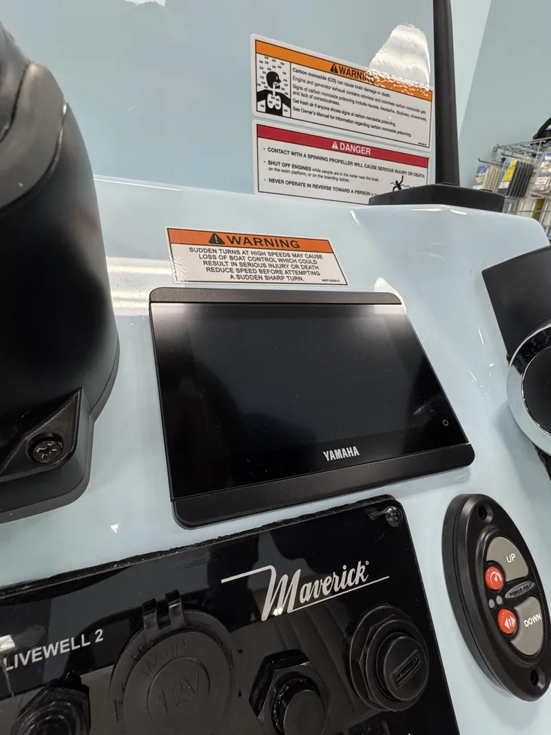 Slide: The Image of Maverick HPX-S 2026 boat console with Yamaha display and warning labels. - 13