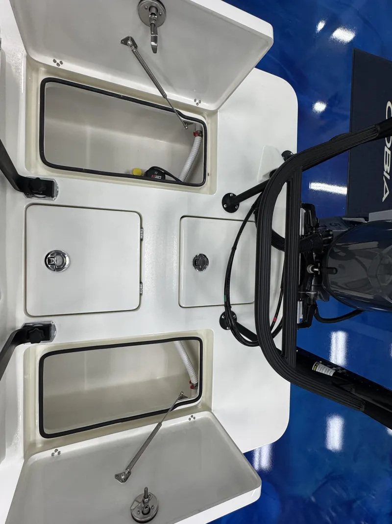 Slide: The Image of Maverick HPX-S 2026 boat deck with storage compartments and motor. - 17