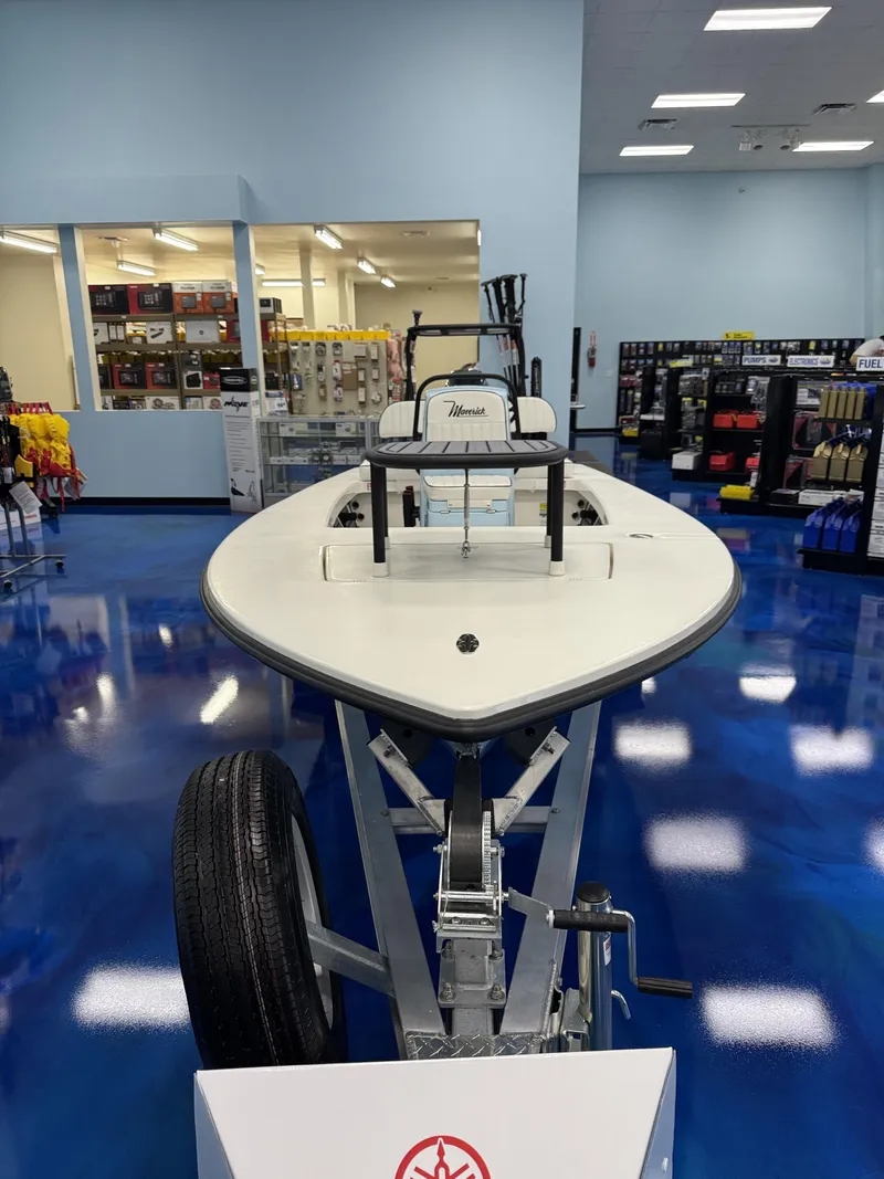 Slide: The Image of Maverick HPX-S 2026 boat in showroom on blue floor. - 22