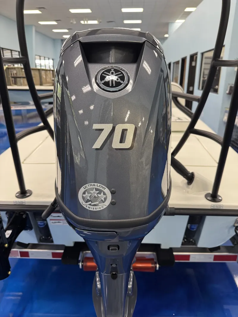 Slide: The Image of Maverick HPX-S 2026 outboard motor with 70 HP and low emissions. - 23