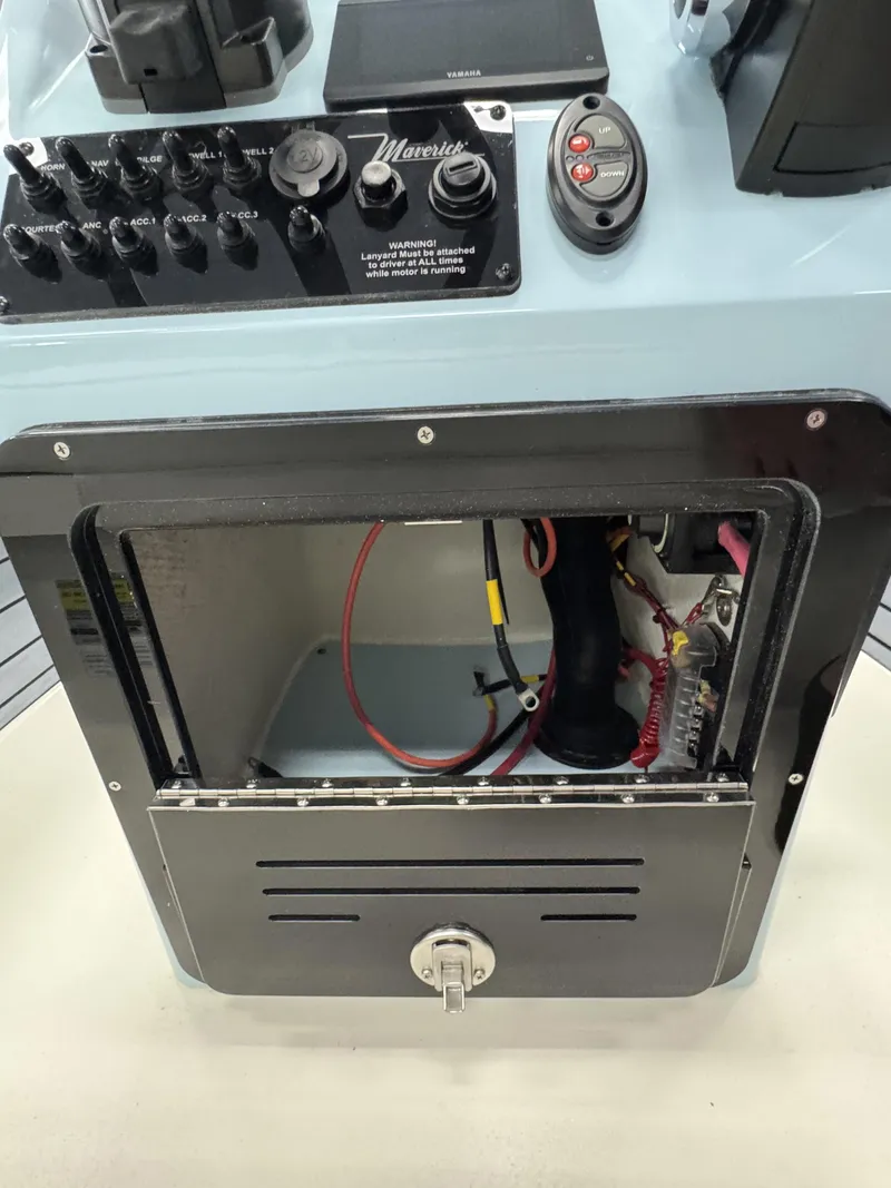 Slide: The Image of Maverick HPX-S 2026 control panel with open wiring and controls. - 32