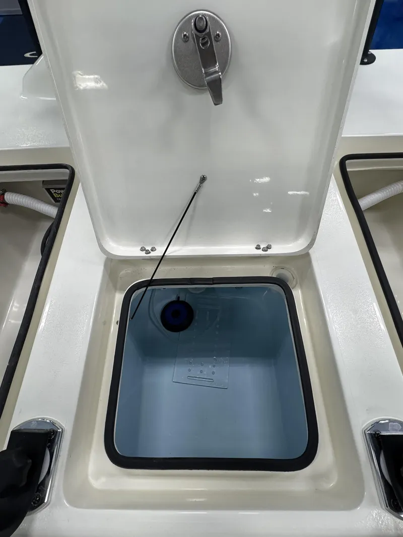 Slide: The Image of Open storage compartment in Maverick HPX-S 2026 boat. - 33